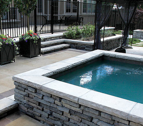 Flag stone custom retaining walls and custom pools